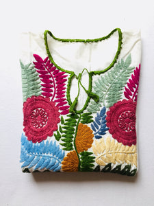 mexican embroidered blouse with colorful details in green blue mustard and beige