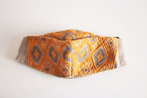 protective face mask in beautiful orange and light brown embroidery