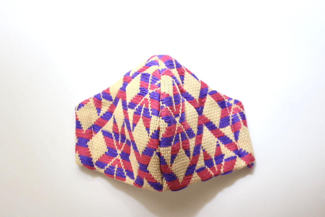 beautiful knitted mexican design face masks in pink and violet colors