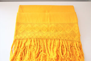 yellow rebozo made by mexican community