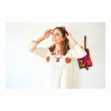 Load image into Gallery viewer, model wearing a mexican blouse with big orange embroidered flowers