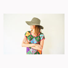 Load image into Gallery viewer, model wearing a fuchsia mexican blouse with wide brimmed hat