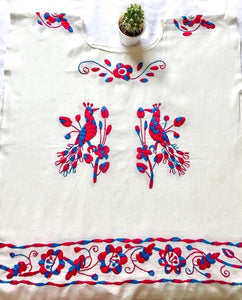 white Mexican blouse with two embroidered peacocks in fuchsia and blue